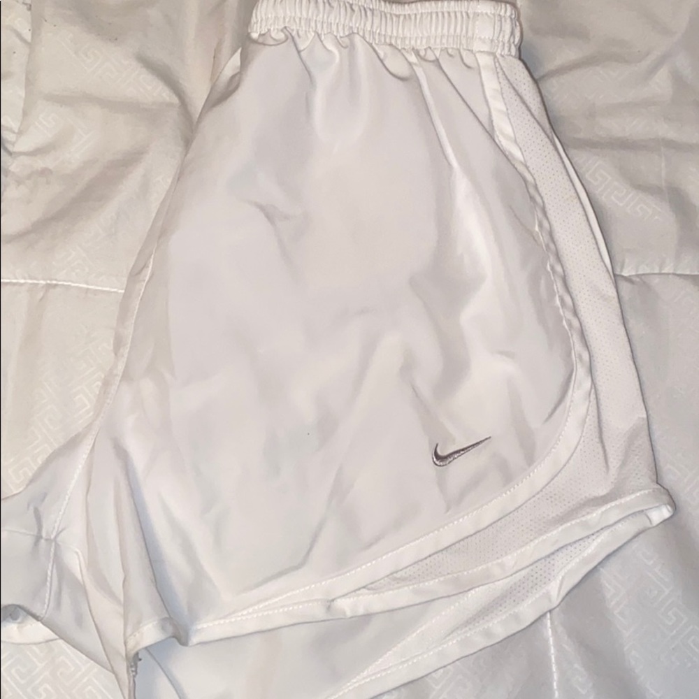 White Nike shorts